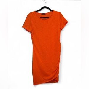 Orange T-Shirt Dress with ruched side used as a maternity dress size medium